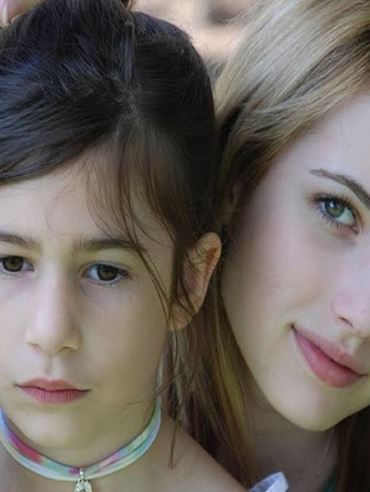 Grace Nickels with her half-sister Emma Roberts 